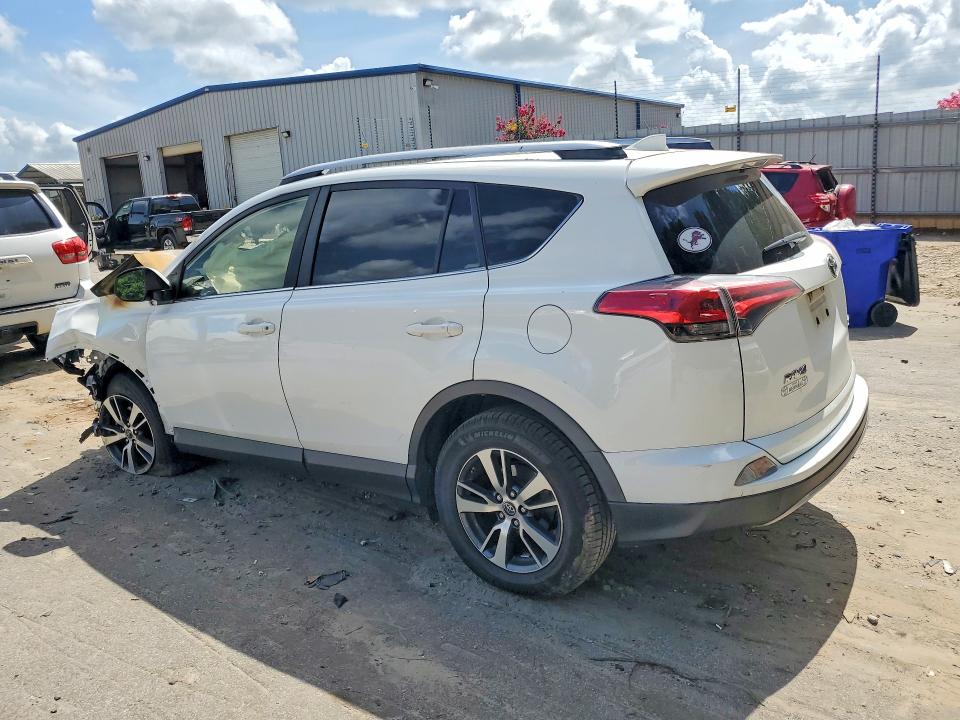 Photo 2 from auction – 2018 TOYOTA RAV4 with VIN JTMWFREVXJJ201370