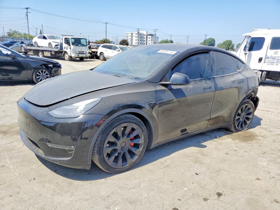 TESLA MODEL Y 2022 with VIN 7SAYGDEF5NF345314 - Photo from auction