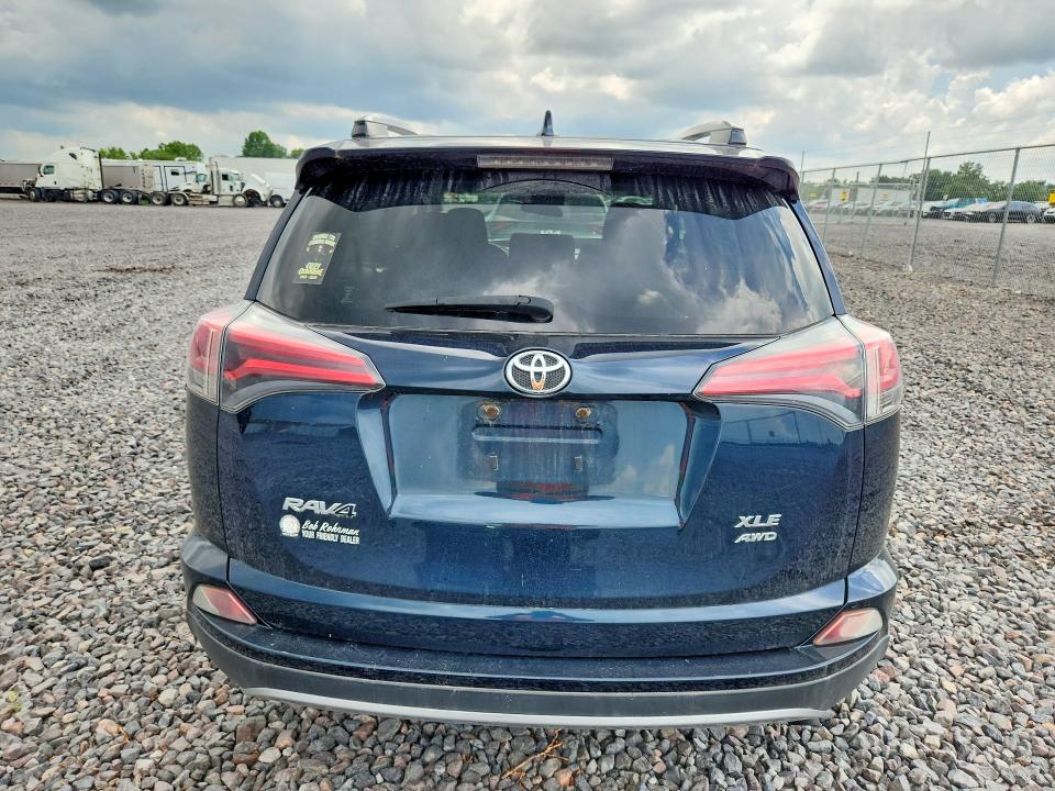 Photo 6 from auction – 2017 TOYOTA RAV4 with VIN JTMRFREV1HJ130812