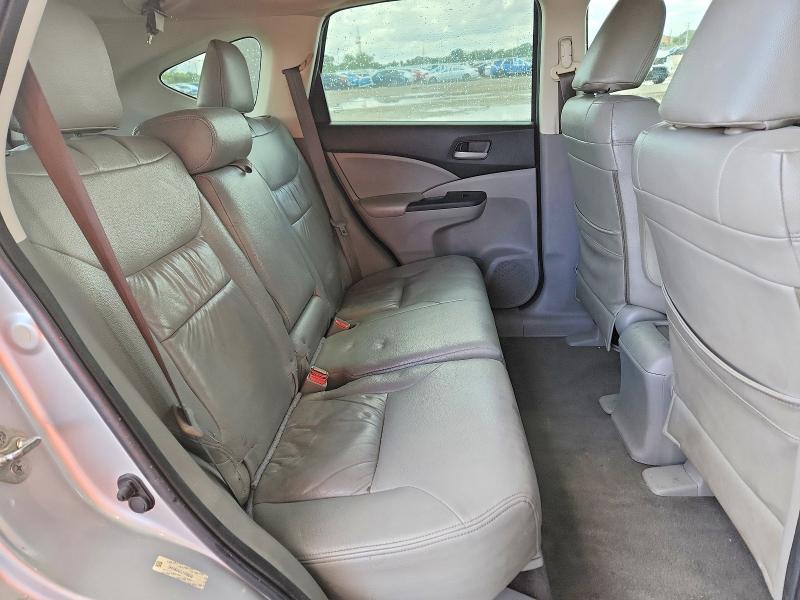 Photo 11 from auction – 2012 HONDA CR-V with VIN 2HKRM3H30CH506396