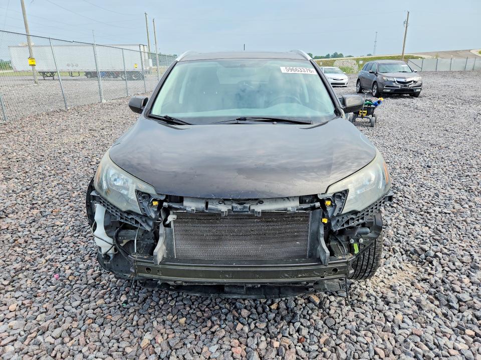Photo 5 from auction – 2014 HONDA CR-V with VIN 2HKRM4H70EH679864