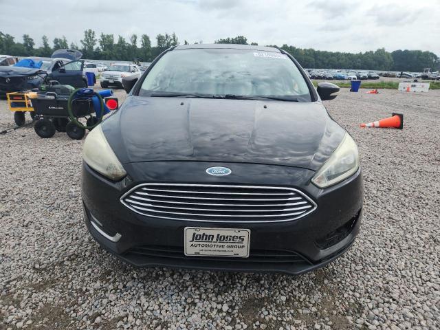 Photo 5 from auction – 2015 FORD FOCUS with VIN 1FADP3J25FL238230