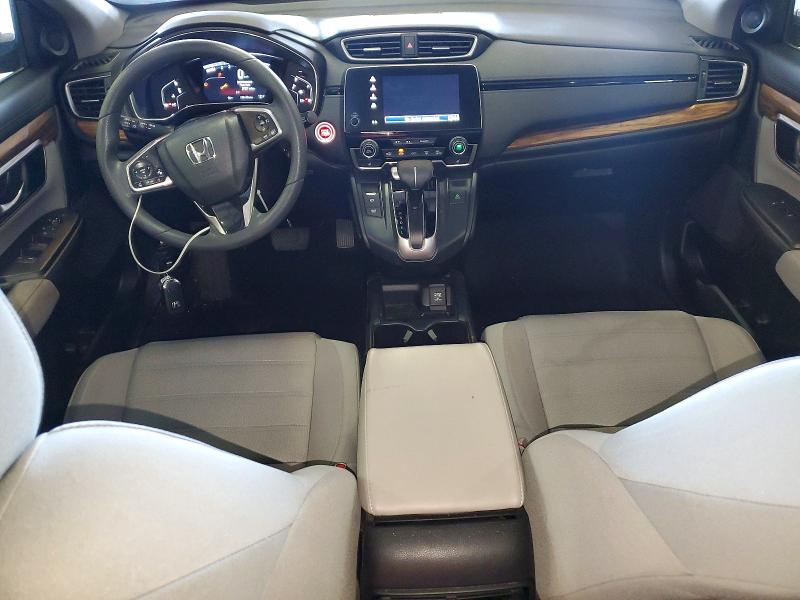 Photo 8 from auction – 2018 HONDA CR-V with VIN 7FARW1H56JE034334