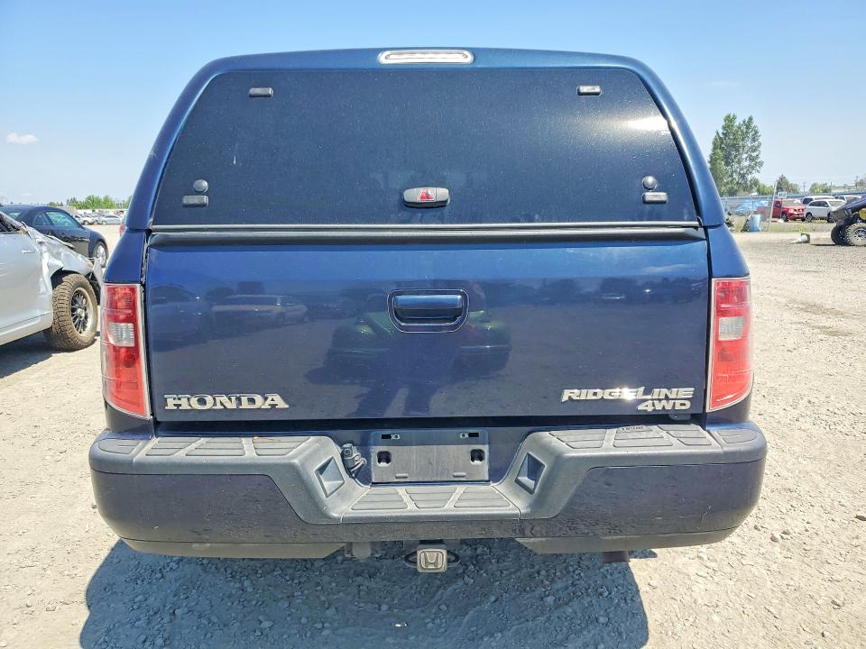 Photo 6 from auction – 2010 HONDA RIDGELINE with VIN 5FPYK1F50AB007823