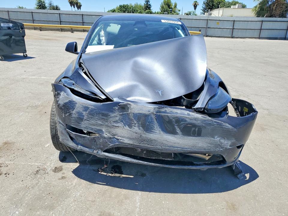Photo 5 from auction – 2025 TESLA MODEL Y with VIN 7SAYGDED7SF240686
