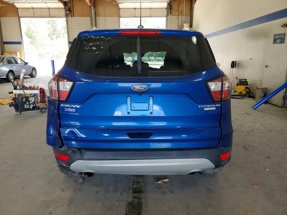 Foto 6 de la subasta – 2017 FORD ESCAPE con VIN 1FMCU0J99HUE43889