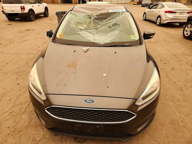 Photo 5 from auction – 2016 FORD FOCUS with VIN 1FADP3F20GL279147