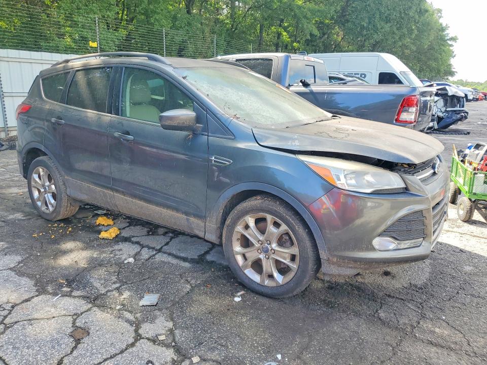 Photo 4 from auction – 2016 FORD ESCAPE with VIN 1FMCU9GX0GUB79924
