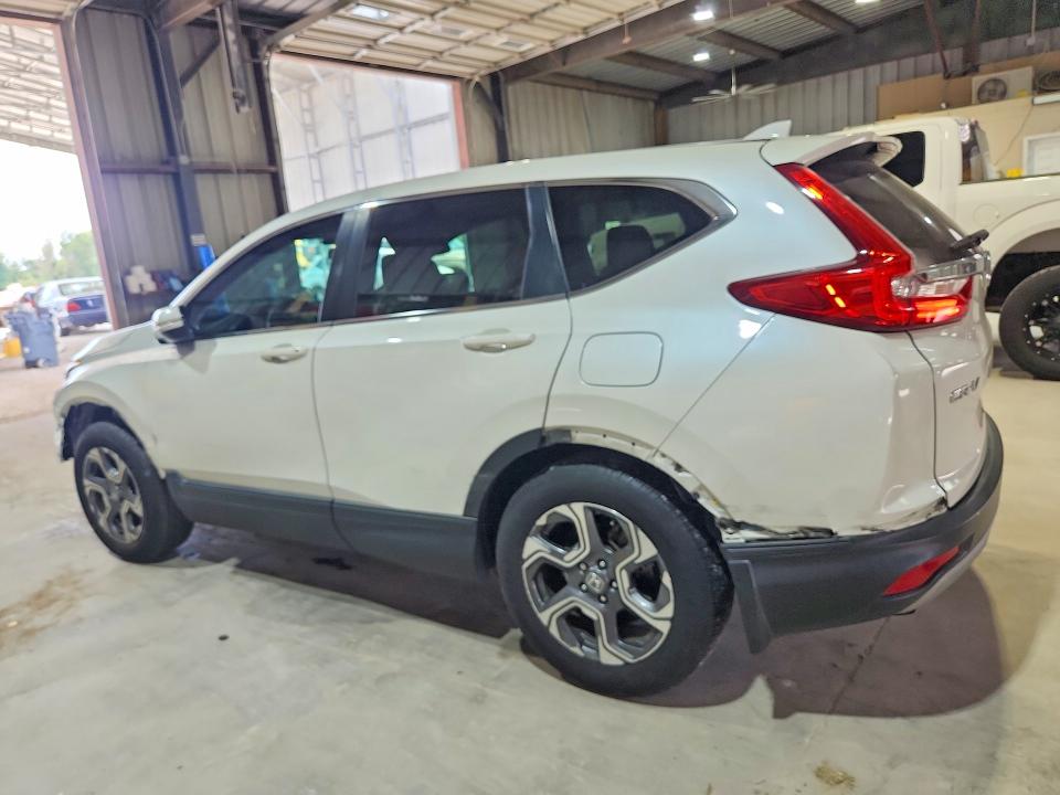 Photo 2 from auction – 2018 HONDA CR-V with VIN 2HKRW2H53JH636899