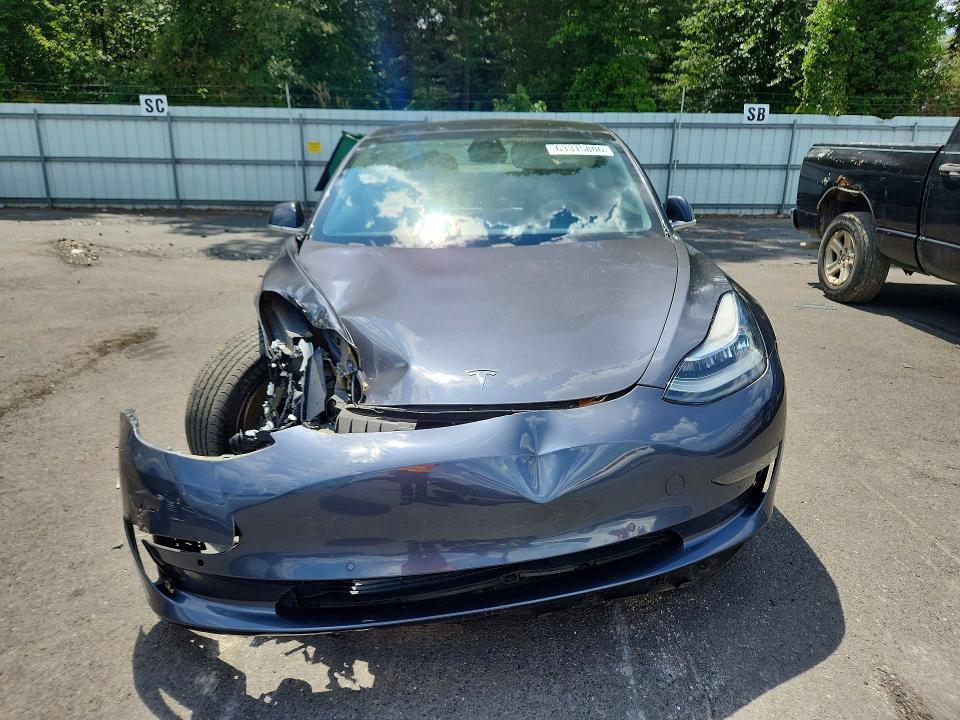 Photo 5 from auction – 2019 TESLA MODEL 3 with VIN 5YJ3E1EB0KF392898