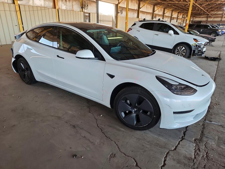 Photo 4 from auction – 2023 TESLA MODEL 3 with VIN 5YJ3E1EA9PF419420