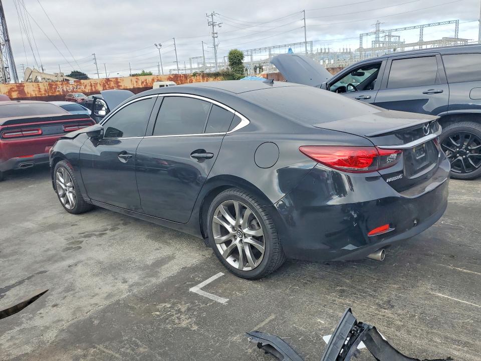 Photo 2 from auction – 2014 MAZDA 6 with VIN JM1GJ1W5XE1109474