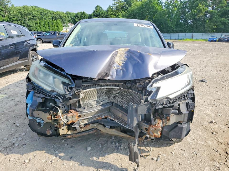 Photo 5 from auction – 2015 HONDA CR-V with VIN 2HKRM4H31FH612849