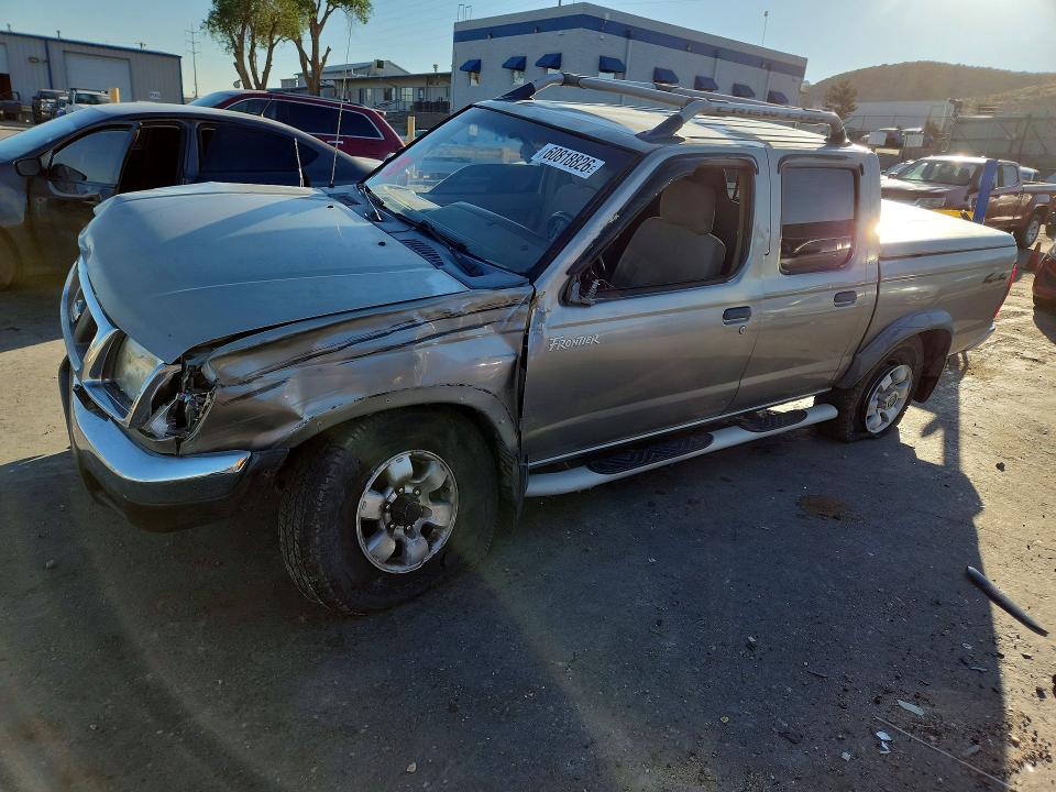 NISSAN FRONTIER 2000 with VIN 1N6ED27Y9YC394428 - Photo from auction