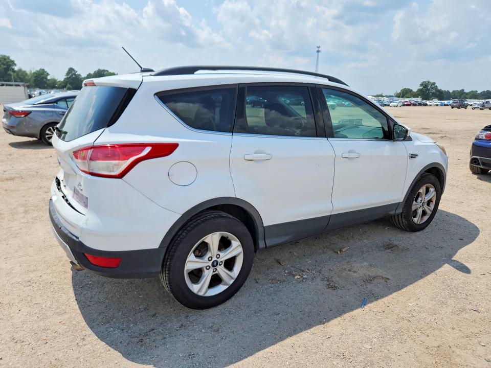 Photo 3 from auction – 2016 FORD ESCAPE with VIN 1FMCU9GX8GUB50414