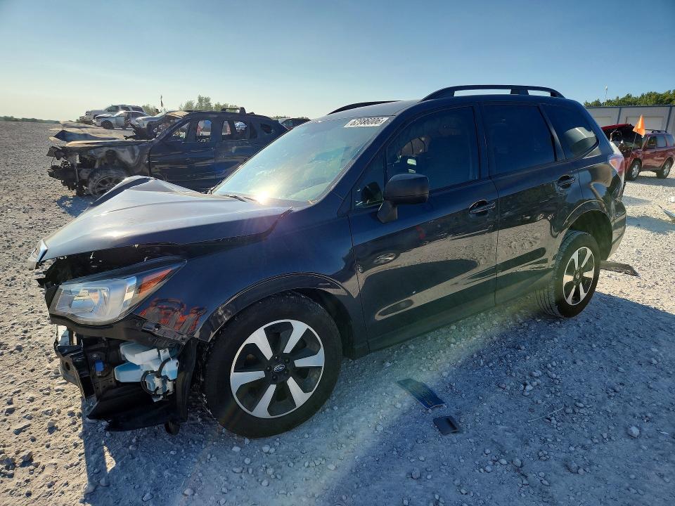 SUBARU FORESTER 2017 with VIN JF2SJABC0HH576642 - Photo from auction