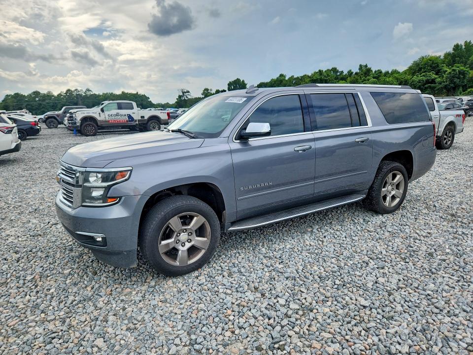 CHEVROLET SUBURBAN 2020 with VIN 1GNSCJKC9LR218622 - Photo from auction