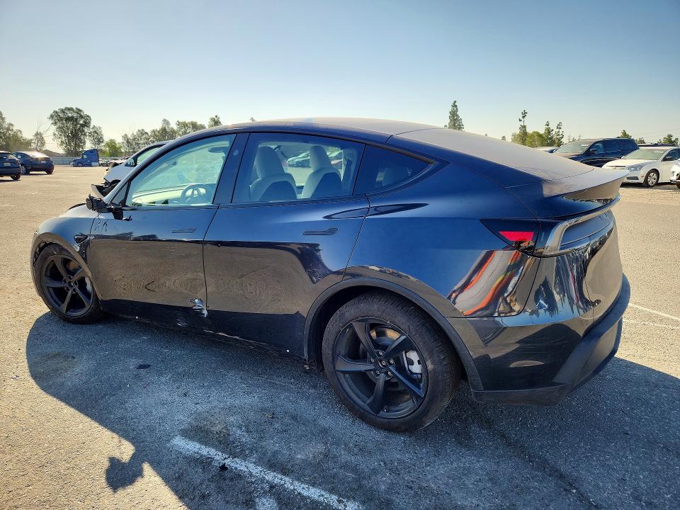 Photo 2 from auction – 2026 TESLA MODEL Y with VIN 7SAYGDED7TF559054