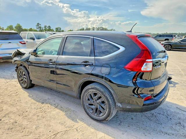 Photo 2 from auction – 2016 HONDA CR-V with VIN 2HKRM3H78GH561445