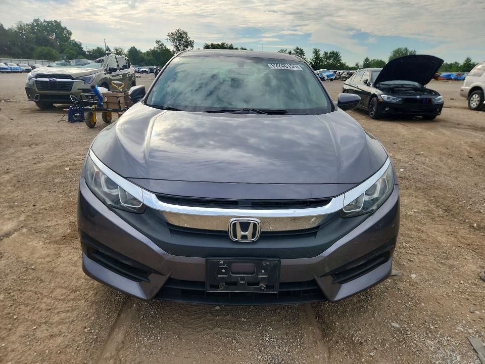 Photo 5 from auction – 2018 HONDA CIVIC with VIN 19XFC2F51JE006883