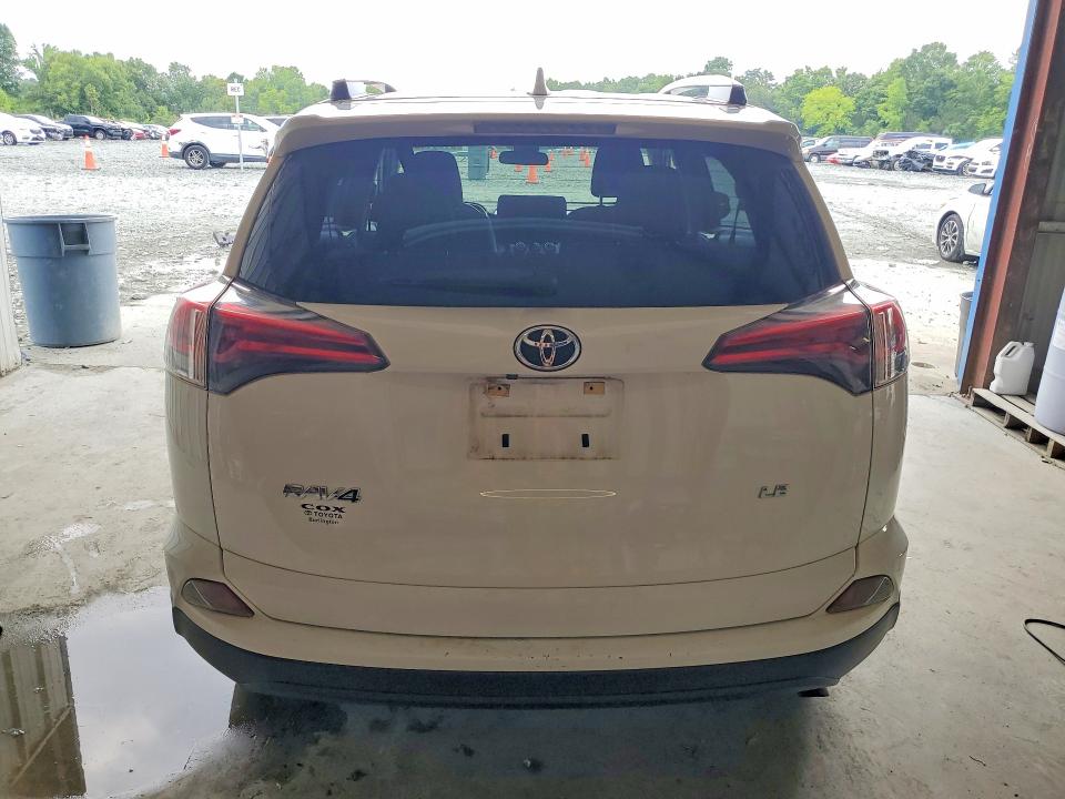 Photo 6 from auction – 2018 TOYOTA RAV4 with VIN JTMZFREV8JJ190382