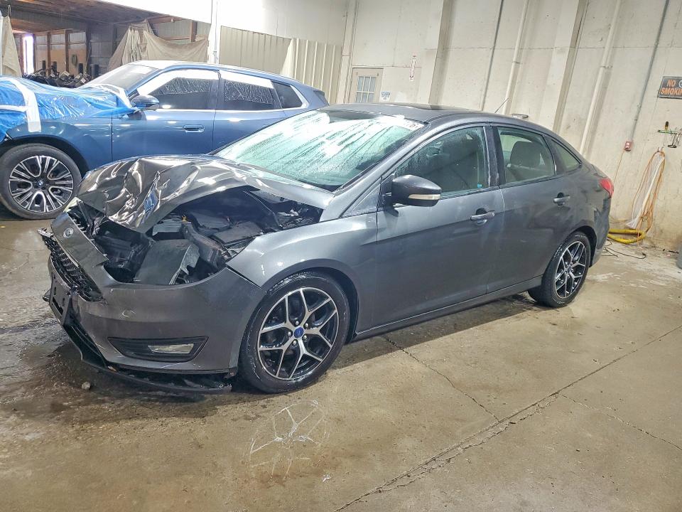 FORD FOCUS 2017 with VIN 1FADP3H2XHL256215 - Photo from auction