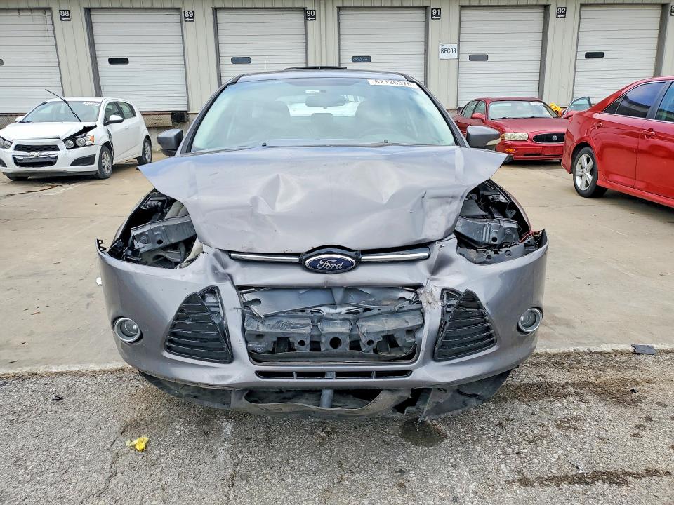 Photo 5 from auction – 2014 FORD FOCUS with VIN 1FADP3N21EL370782