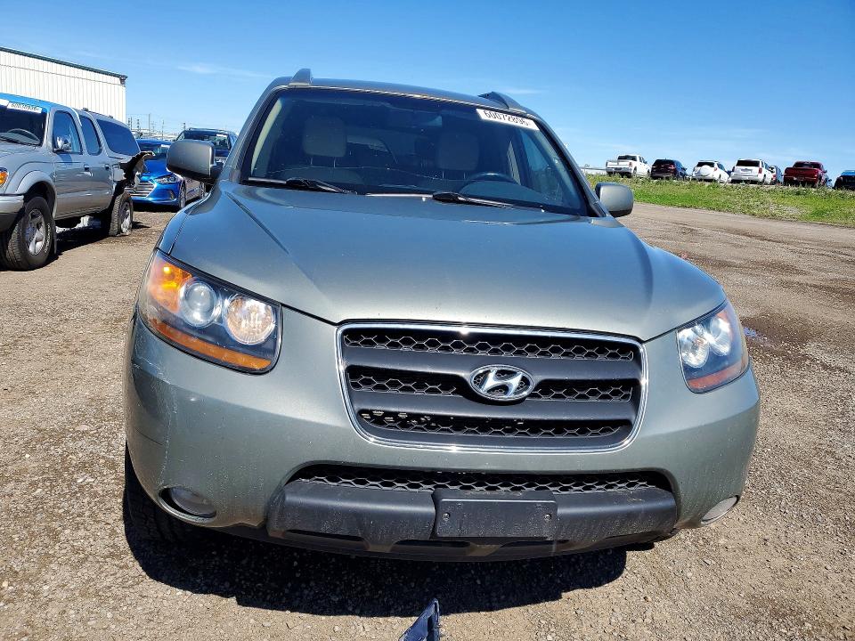Photo 5 from auction – 2009 HYUNDAI SANTA FE with VIN 5NMSG13E39H291219