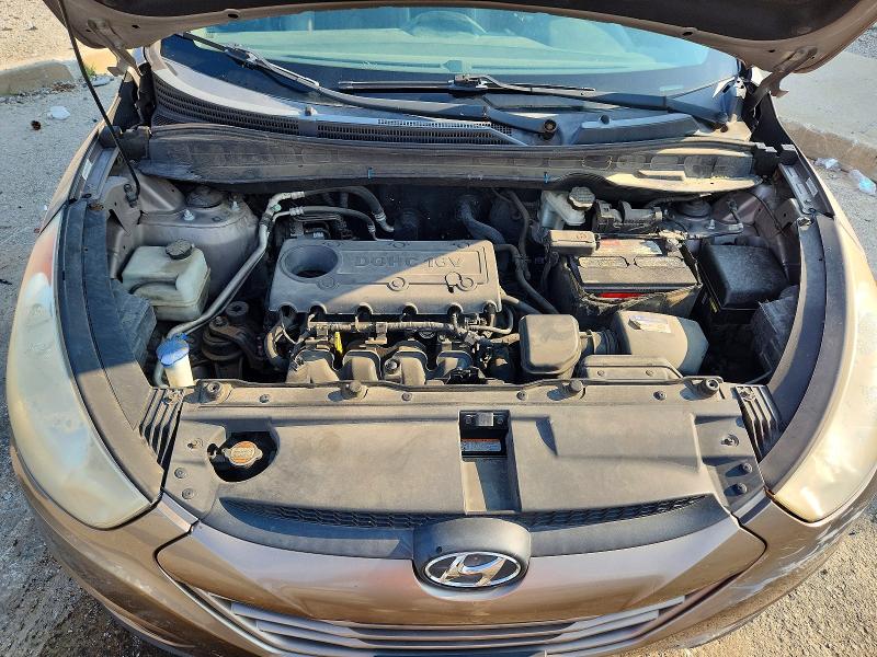 Photo 12 from auction – 2011 HYUNDAI TUCSON with VIN KM8JU3AC2BU171147