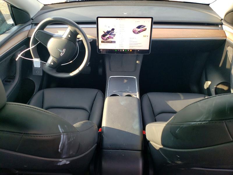 Photo 8 from auction – 2023 TESLA MODEL Y with VIN 7SAYGDED6PF940819
