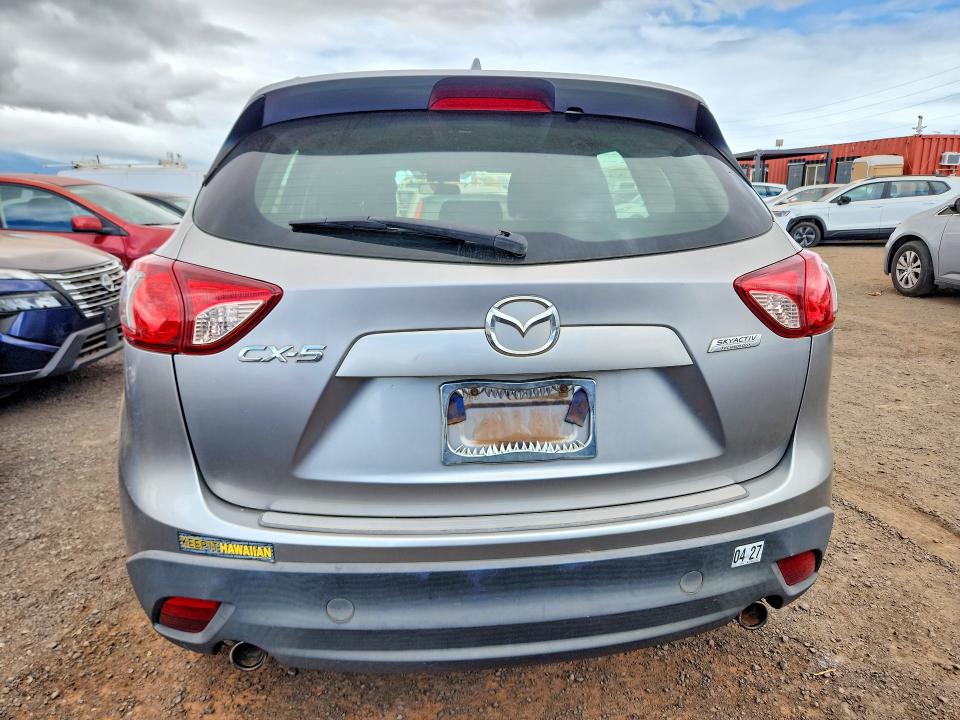 Photo 6 from auction – 2014 MAZDA CX-5 with VIN JM3KE2BE0E0320433