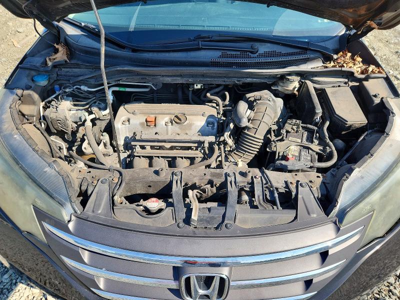 Photo 12 from auction – 2014 HONDA CR-V with VIN 2HKRM4H31EH702744