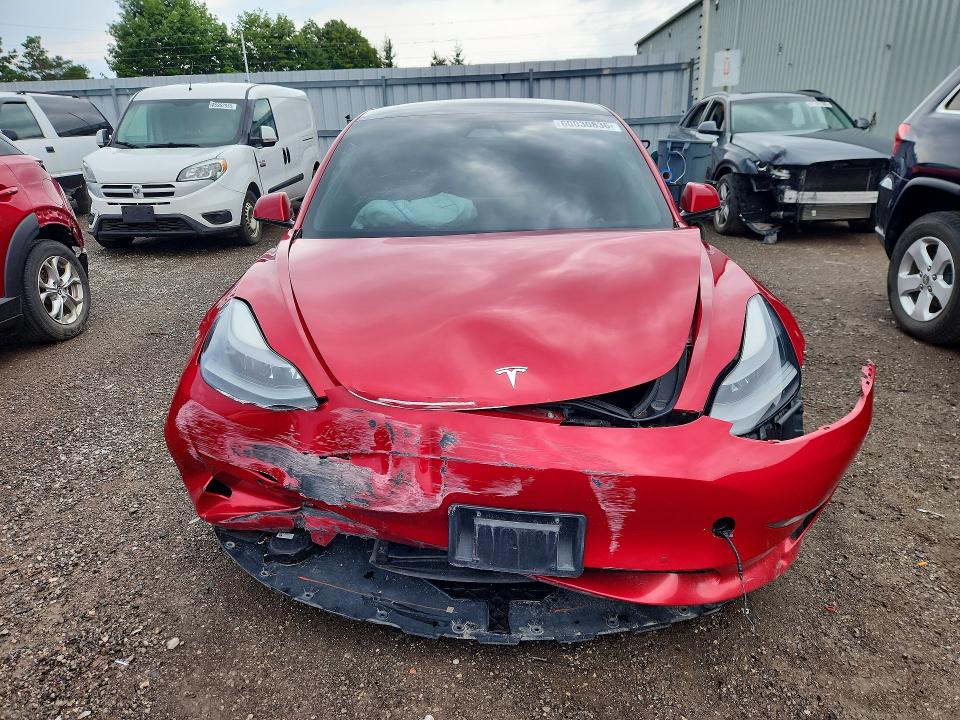 Photo 5 from auction – 2021 TESLA MODEL 3 with VIN 5YJ3E1EAXMF918268