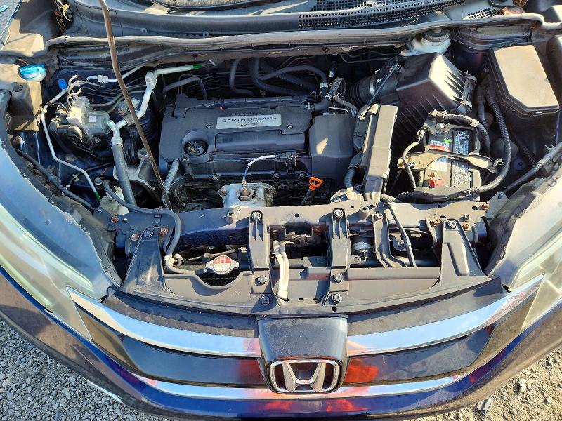 Photo 12 from auction – 2015 HONDA CR-V with VIN 2HKRM4H71FH627905