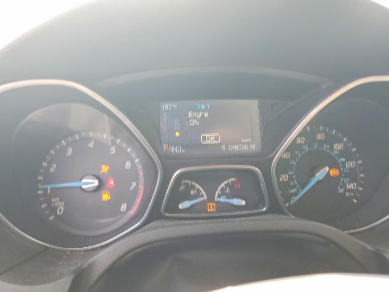 Photo 9 from auction – 2014 FORD FOCUS with VIN 1FADP3F24EL351738
