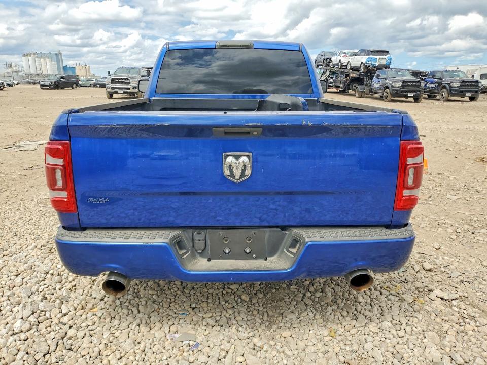 Снимка 6 от търг – 2015 RAM 1500 с VIN 3C6JR6AT7FG631099