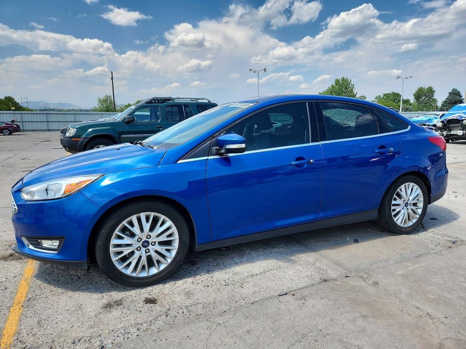 FORD FOCUS 2018 with VIN 1FADP3J22JL260095 - Photo from auction