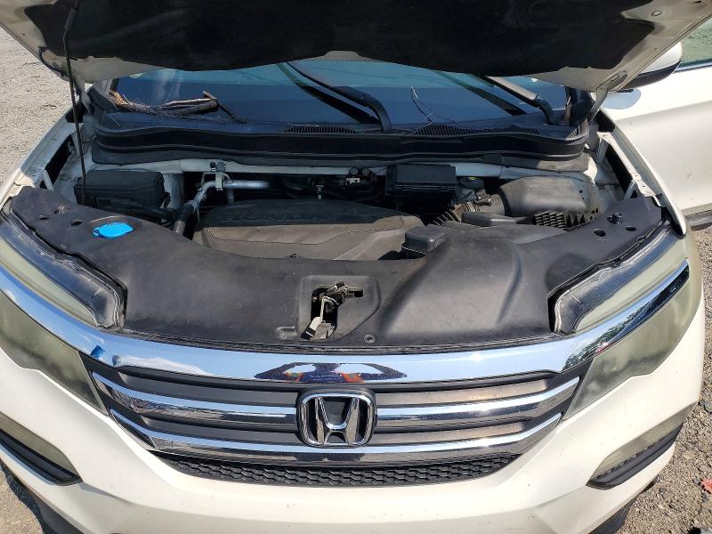 Photo 12 from auction – 2016 HONDA PILOT with VIN 5FNYF5H51GB030571