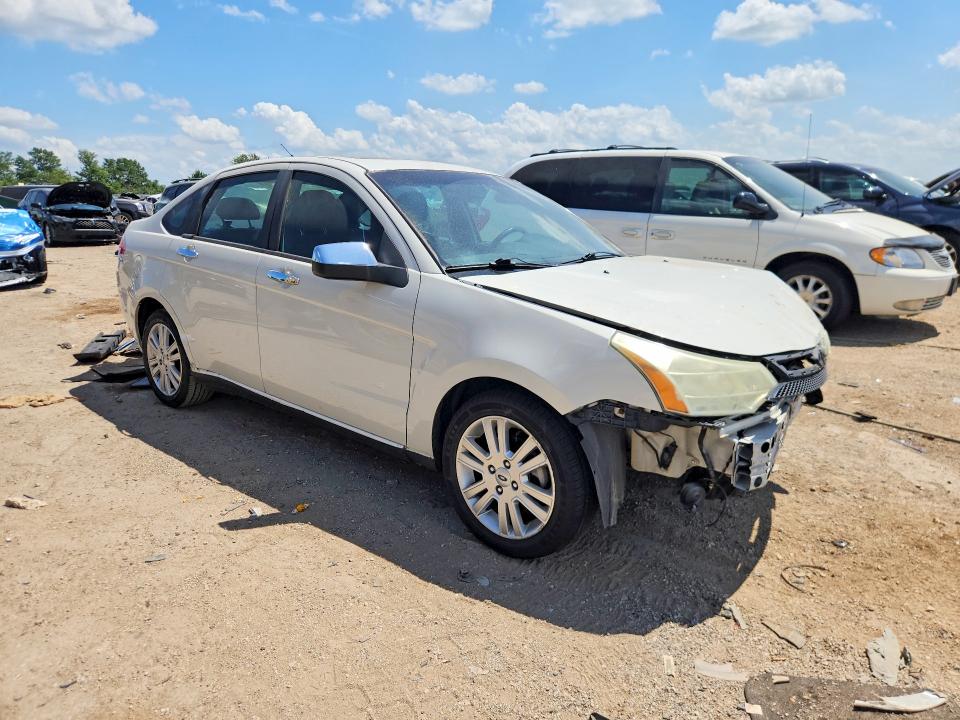 Photo 4 from auction – 2011 FORD FOCUS with VIN 1FAHP3HN6BW143895