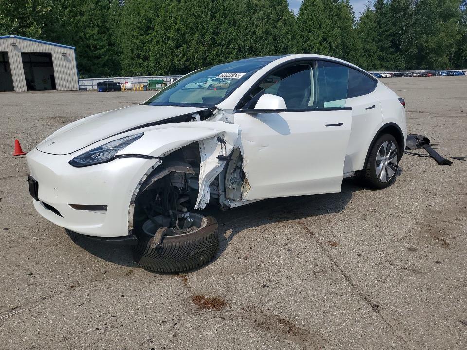 TESLA MODEL Y 2022 with VIN 7SAYGAEE5NF329894 - Photo from auction