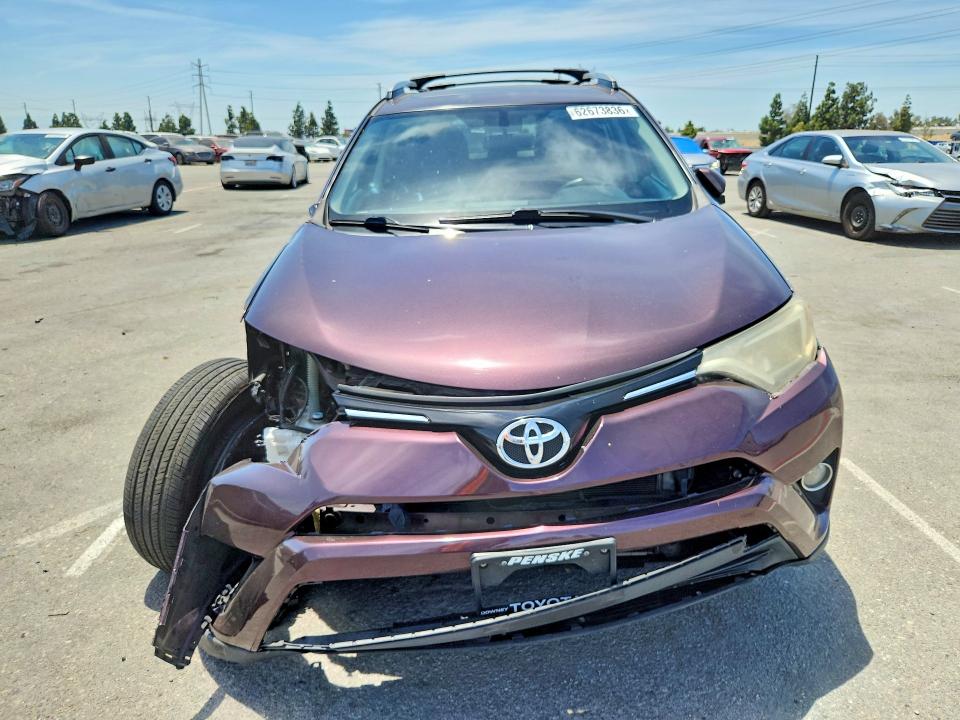 Photo 5 from auction – 2016 TOYOTA RAV4 with VIN 2T3WFREV8GW264171