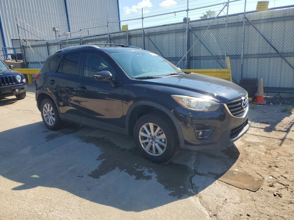 Photo 4 from auction – 2016 MAZDA CX-5 with VIN JM3KE4CY9G0675303