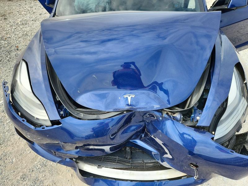 Снимка 11 от търг – 2021 TESLA MODEL 3 с VIN 5YJ3E1EA4MF014593