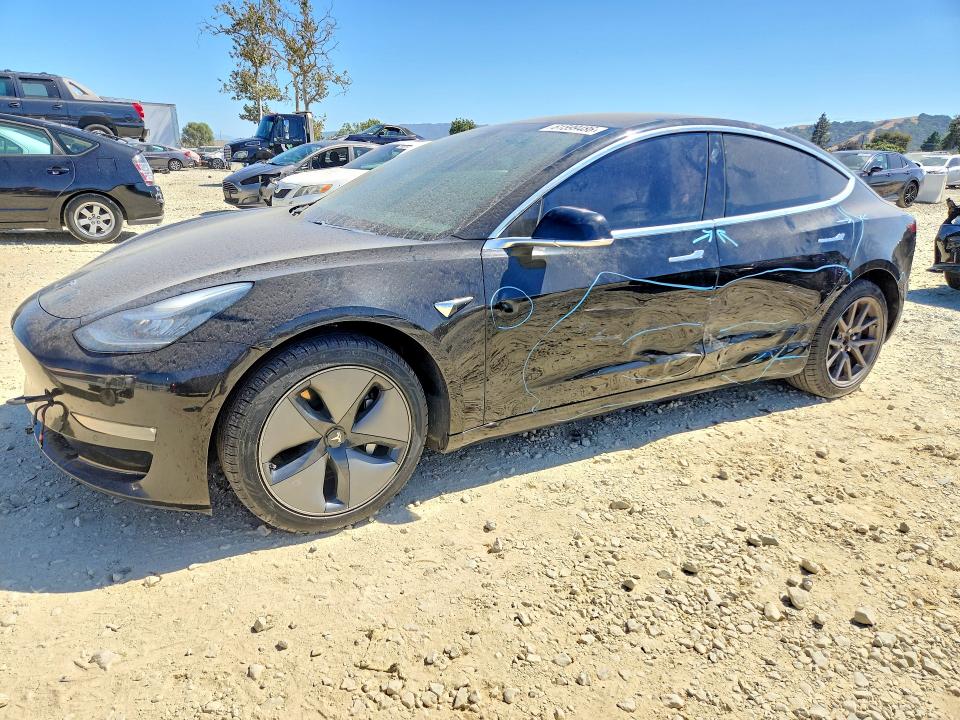 TESLA MODEL 3 2019 with VIN 5YJ3E1EAXKF398392 - Photo from auction