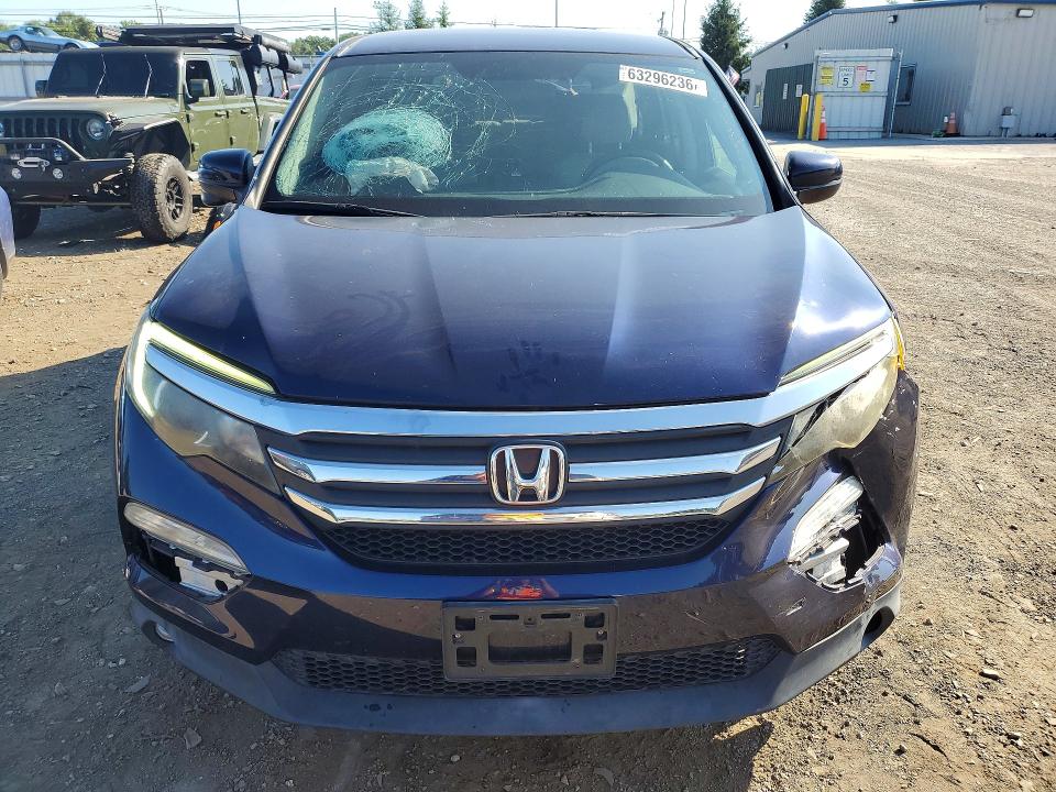 Photo 5 from auction – 2018 HONDA PILOT with VIN 5FNYF6H31JB051982