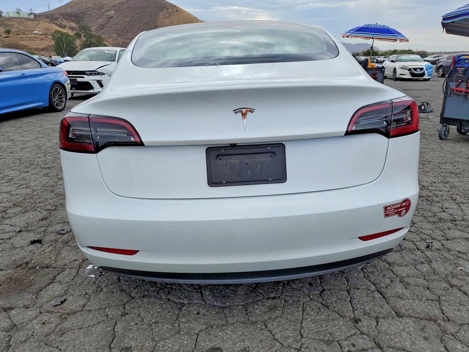 Photo 6 from auction – 2023 TESLA MODEL 3 with VIN 5YJ3E1EA7PF599996