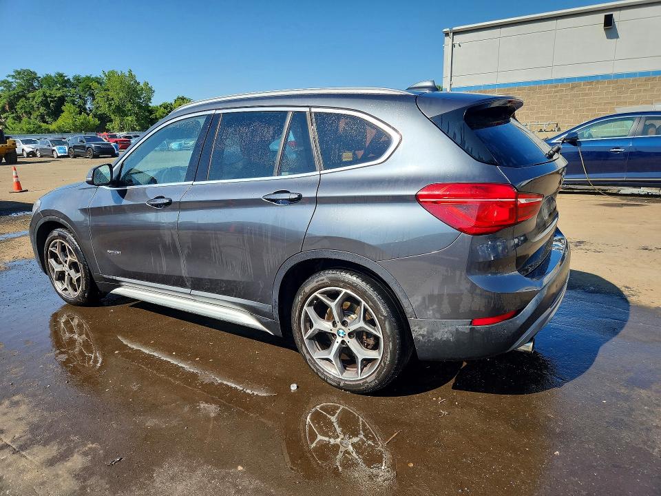 Photo 2 from auction – 2017 BMW X1 with VIN WBXHT3C3XH5F81805