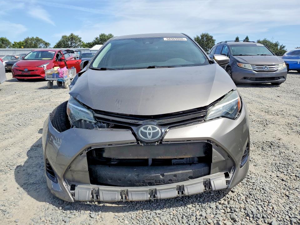 Photo 5 from auction – 2018 TOYOTA COROLLA with VIN 2T1BURHE5JC105304