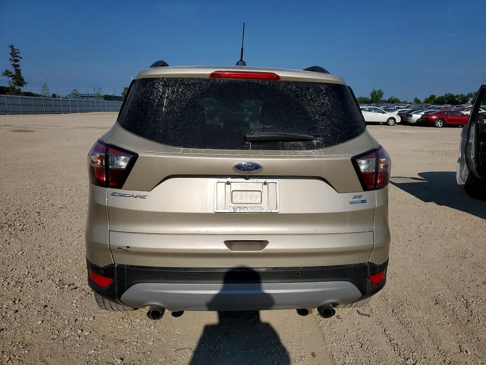 Photo 6 from auction – 2017 FORD ESCAPE with VIN 1FMCU9GD8HUE34066