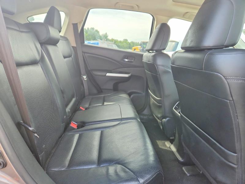 Photo 11 from auction – 2016 HONDA CR-V with VIN 5J6RM4H79GL052167